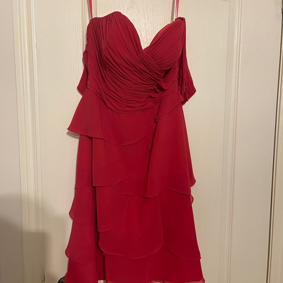 Dress never worn. 

Color: bright pink. 

Comes with removable straps. - Picture 5 of 6